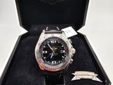 a watch that is in a box with a tag on it