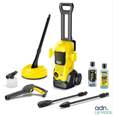 a yellow and black pressurer and cleaning kit with tools