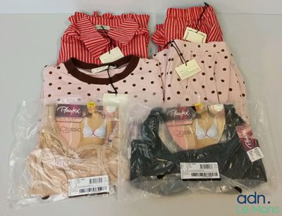 three bags of underwear and a bag of bras on a table