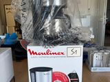 a box with a coffee maker on it on a table
