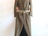 an image of a military uniform is displayed on a mannequin
