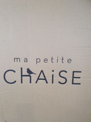 a close up of a box with a bird on it