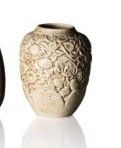 two vases sitting side by side on a white surface