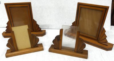 three wooden picture frames on display on a table