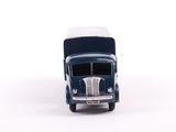 a toy truck that is sitting on a white surface