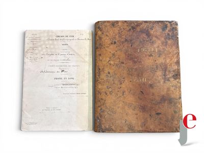an old book with a piece of paper on it