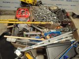 a box full of assorted tools sitting on the floor