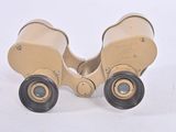 a pair of binoculars that are sitting on a table