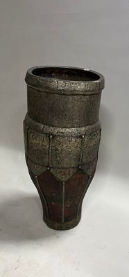 two vases that are sitting on a white surface