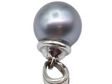 an image of a black pearl and silver ring on a white background