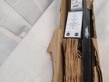 a cardboard box with a bunch of wood in it