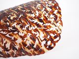 a tortoise shell with a floral design on it