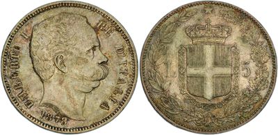 a coin with the image of a man ' s head and a crown on it