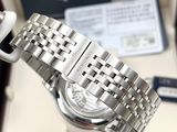 a watch that is sitting in a box on a table