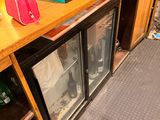 a counter with a bunch of items on top of it