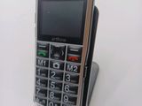 a cell phone that is sitting on top of a stand