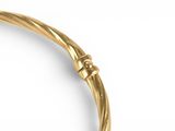 an image of a close up of a gold bracelet on a white background
