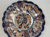 three plates that are sitting on top of a table