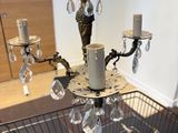 a chandelier that is sitting on top of a table