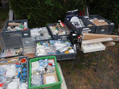 many boxes of assorted items sitting on a table