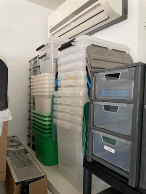a room with a lot of boxes and boxes on the floor