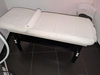 Table de massage en skaï blanc et mélaminé laqué noir