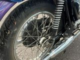 a motorcycle that is parked on the side of the road