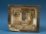 a miniature picture of a shrine in a shadow box