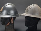 two helmets sitting on top of each other on a mannequin head