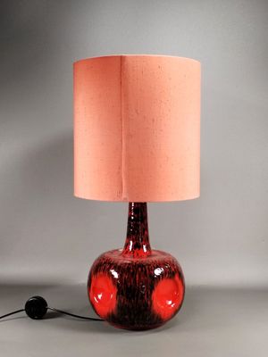 Lampe en céramique émaillée rouge à décor de coulures noires…