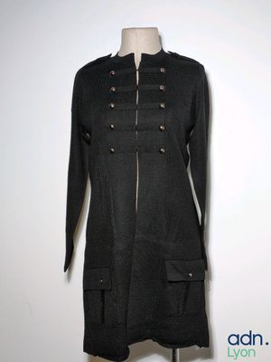 the dress is black and has buttons on the front