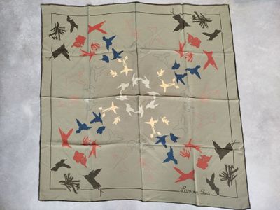 an image of a handkerchief with birds and flowers on it