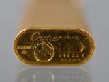 a close up of a gold bar on a table