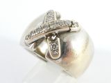 an image of a silver ring with diamonds on a white background