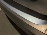 a close up of a car ' s front bumper