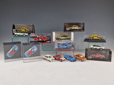 a lot of toy cars that are in a display case