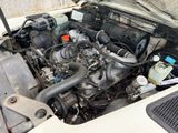a car engine that is sitting in the trunk of a truck