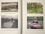pictures of a man holding a fish in a book