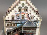 a small model of a building with a staircase going up to it