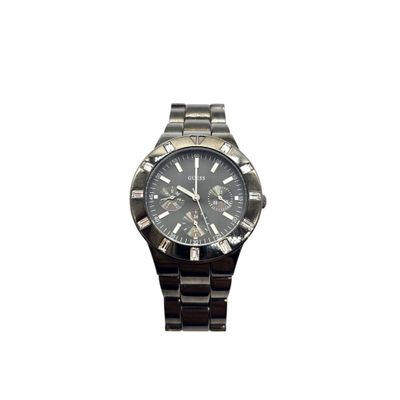 a close up of a watch on a white background