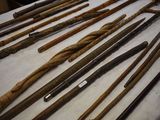 many different types of canes on a table
