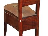 a wooden chair with a wooden seat on a white background