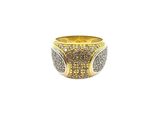 a close up of a gold ring with brown and white diamonds