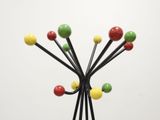 a picture of a multicolored tree made of sticks