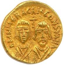 une pièce d'or sur laquelle figurent les portraits d'un homme et d'une femme