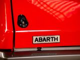 a close up of a red car with the name abarth on it