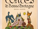 un livre sur lequel figurent l'image d'un château et celle d'un oiseau