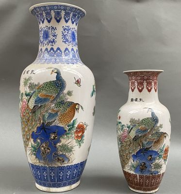 two vases sitting next to each other on a table