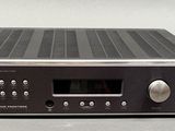 an image of a close up of a stereo device on a table