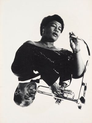 an old black and white photo of a woman holding a trumpet
